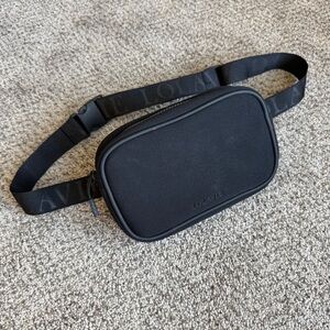 Lolavie Jennifer Aniston Logo Repeat Fanny Pack Crossbody Bag Black